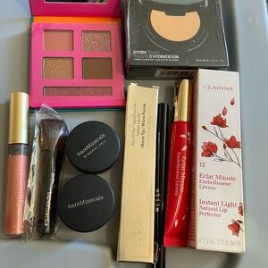 Clarins lip perfector, eye shadow palette and other makeup items
